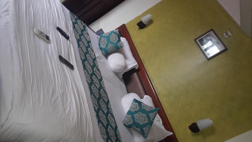 Hotel Peace Park Panvel Extérieur photo